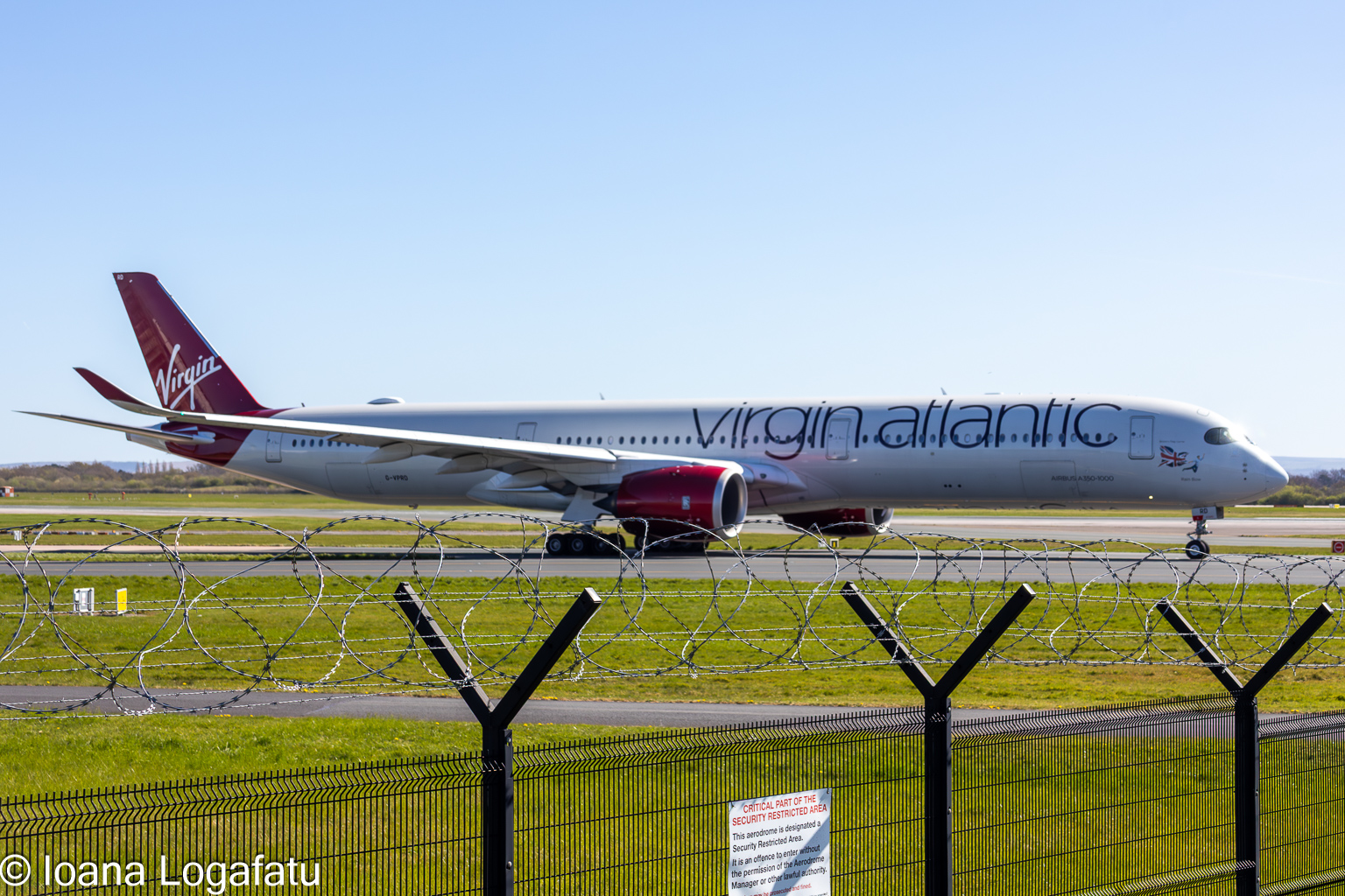 Airplane prepares for takeoff at bustling airport